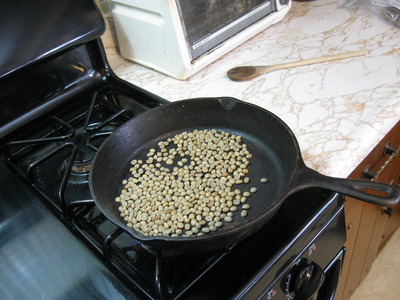 Skillet and unroasted beans