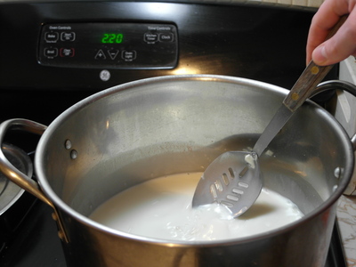 Stir yogurt culture and milk